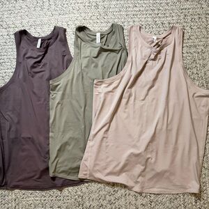3 lululemon all tied up Tank Tops in Frosted Mulberry, Green, and Pink Bliss